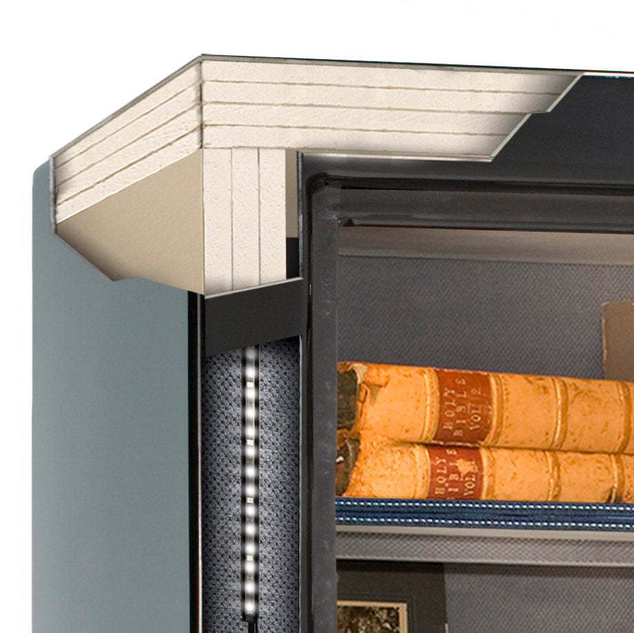 Close-up of a safe with books inside, featuring a steel frame.