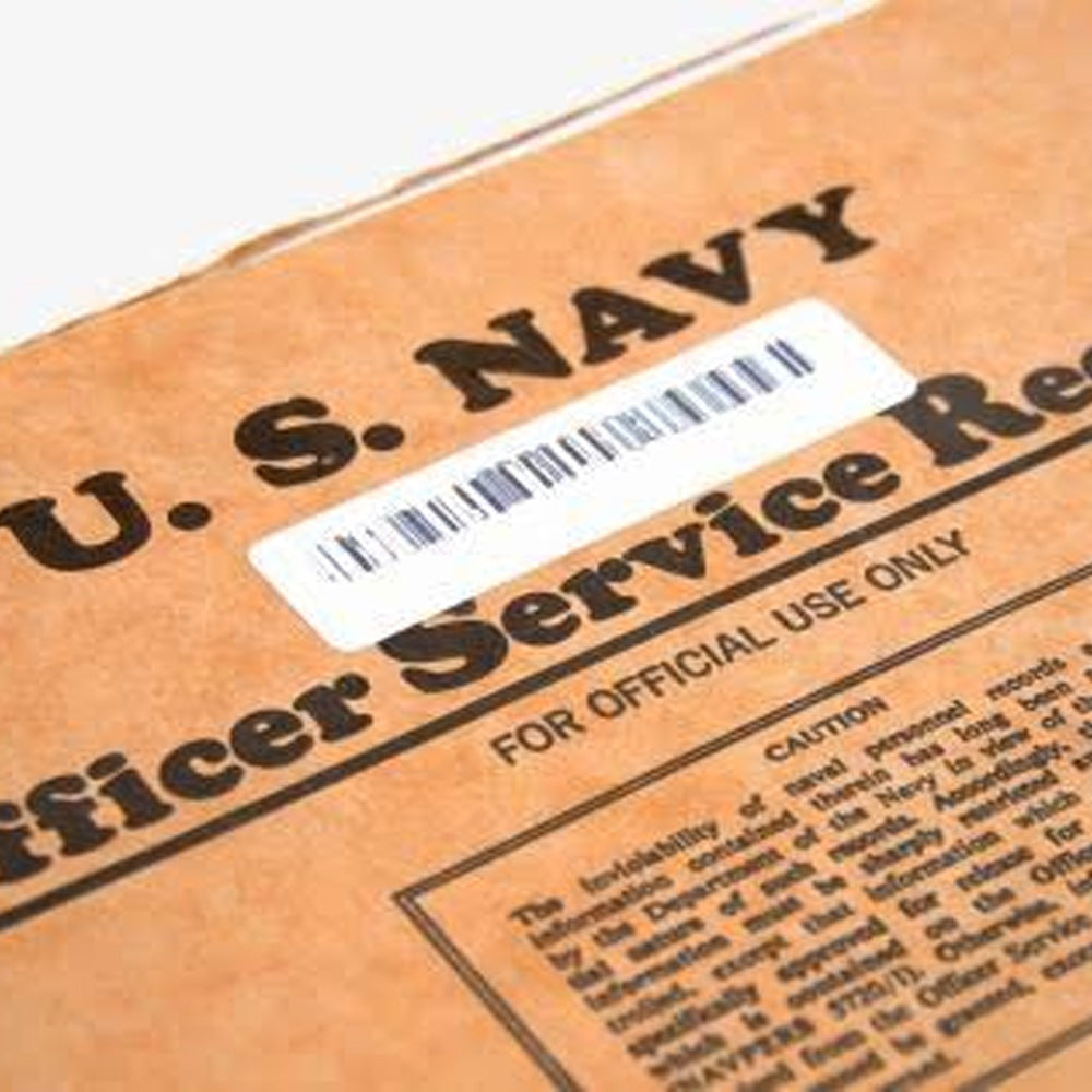 U.S. Navy Officer Service Record box with a barcode label.