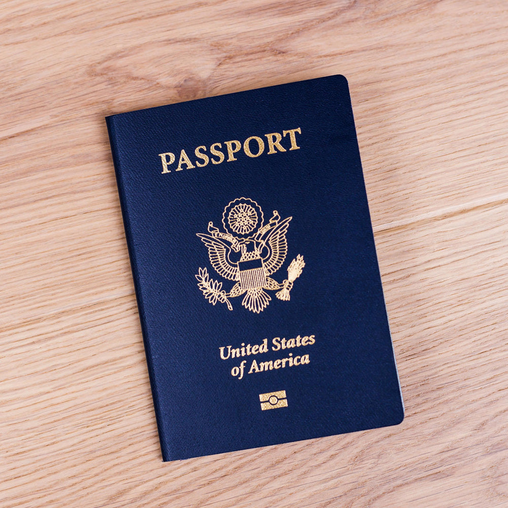 United States passport on a wooden surface
